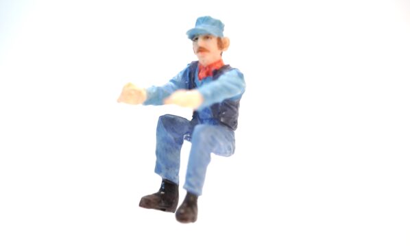 Märklin 600777 1 – Lokführer sitzend, Arme ausgestreckt